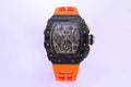 Skeleton Dial Black Bezel Orange Rubber Strap O555