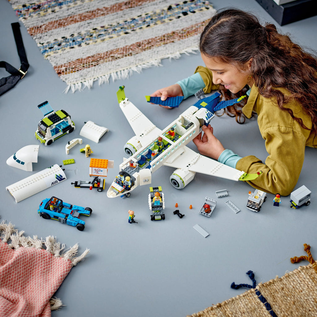 LEGO City Passenger Airplane Building Toy Set with Large Airplane, Passenger Bus, Luggage Truck, Container Loader, and 9 Minifigures C845
