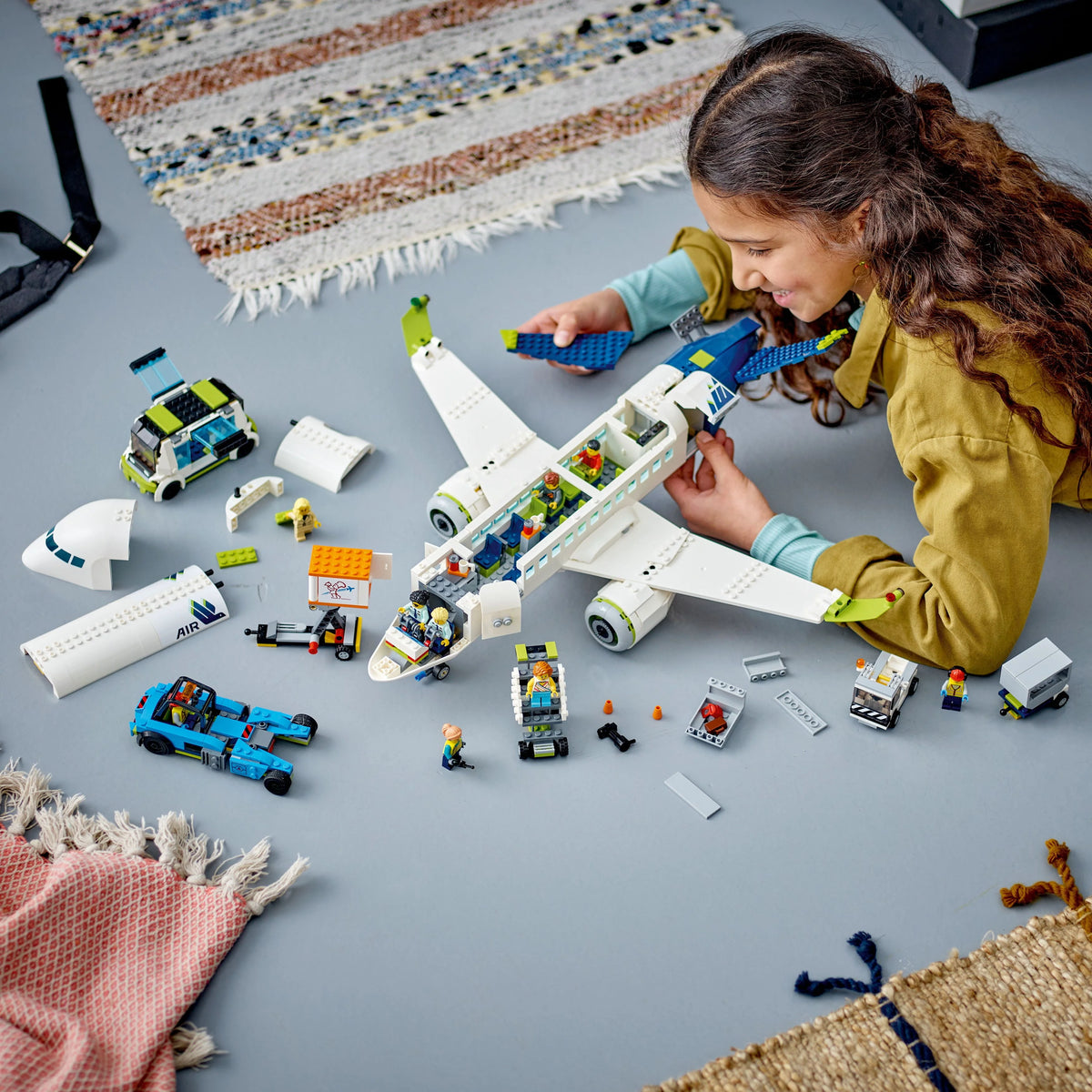 LEGO City Passenger Airplane Building Toy Set with Large Airplane, Passenger Bus, Luggage Truck, Container Loader, and 9 Minifigures C845