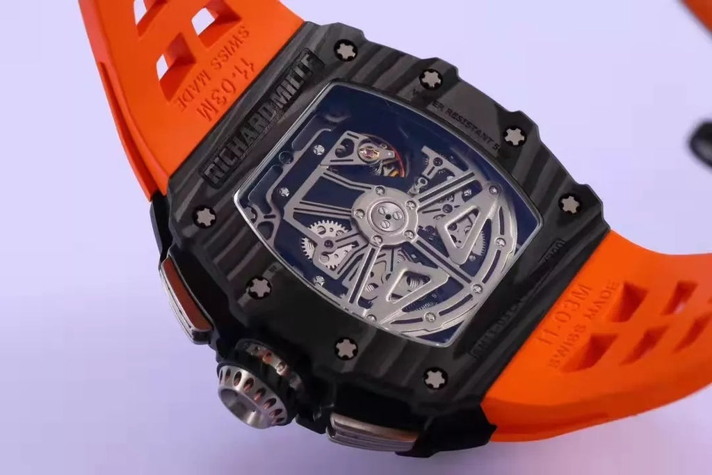 Skeleton Dial Black Bezel Orange Rubber Strap O555